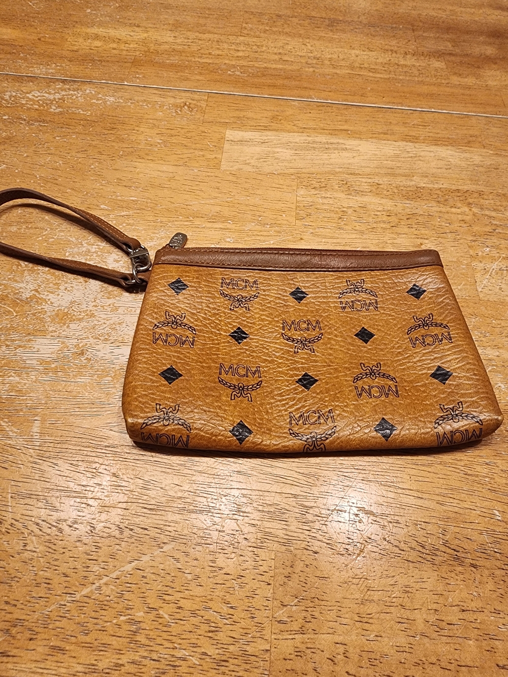 MCM Visetos Monogram Coated Canvas Wristlet Zip Pouch in cognac brown